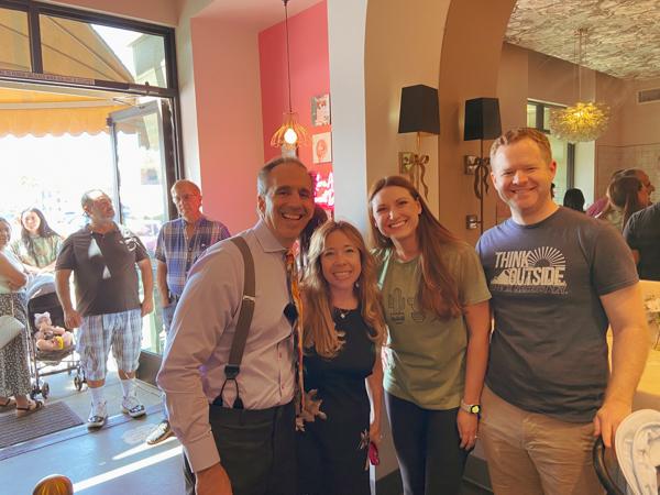 Smiling for a photo with Mark and Alexis Breyer at Sweet Dee's