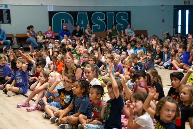 Kids at Teacher of the Month assembly